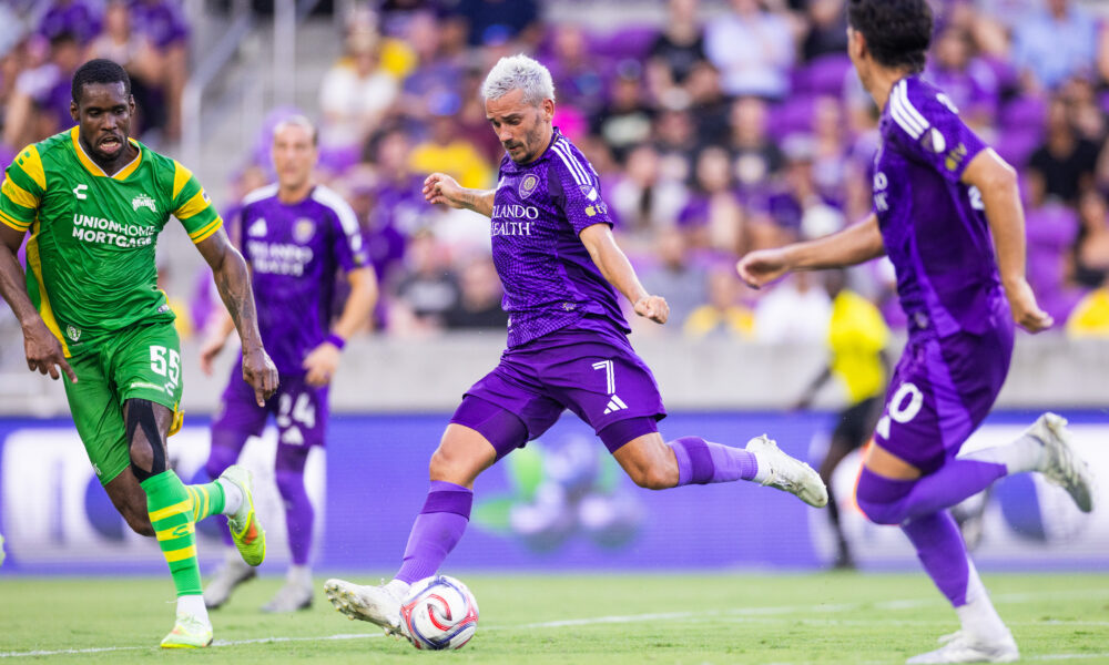Image of Antoine Griezmann firing a shot in a friendly against Tampa Bay.