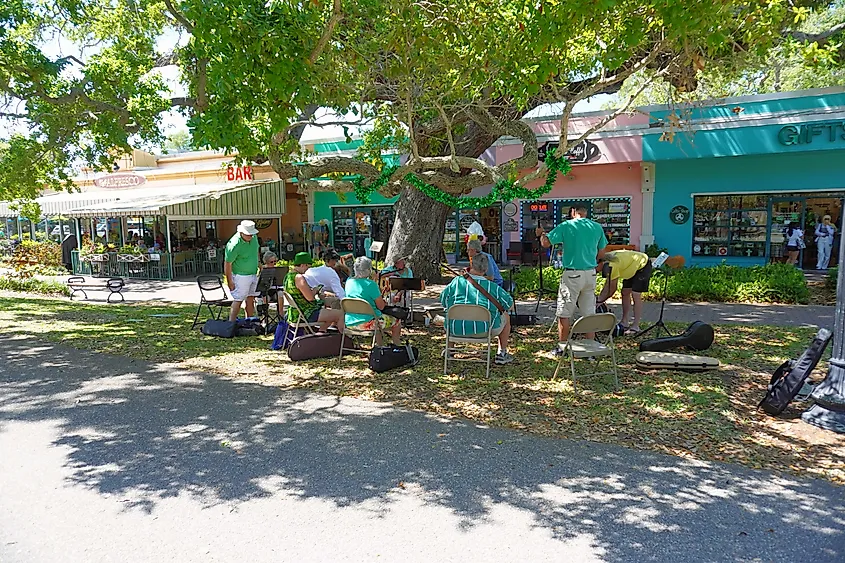People enjoying Saint Patrick's Day downtown, Dunedin, Florida. Image credit: Caleb Kurtz via Shutterstock.