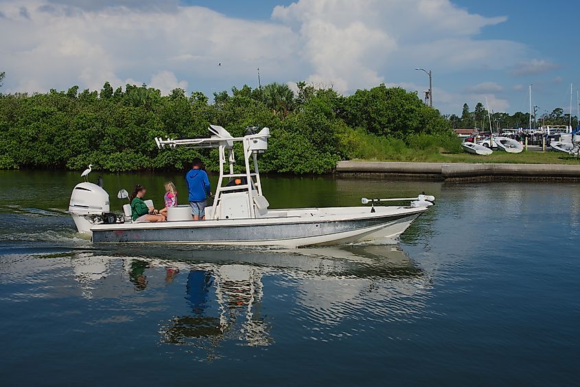 A family enjoying a cozy time on a boat in Gulfport, Florida.