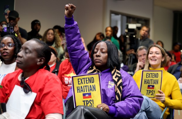 Protesters, including airport, nursing home and hotel workers, join for a press conference and candlelight vigil at Fort Lauderdale-Hollywood International Airport urging the Trump administration to extend Temporary Protected Status (TPS) for Haitian immigrants, Wednesday, Jan. 28, 2026. TPS for Haitian immigrants ends on Feb. 3, and organizers point to the U.S. government's own warnings about the dangers of traveling to Haiti. (Mike Stocker/South Florida Sun Sentinel)