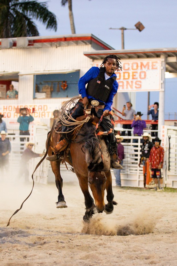 Cowboys and cowgirls will compete in bull riding, ladies barrel racing, chute dogging and ranch bronc riding during the July 25 South Florida Soul Rodeo, which blends Black cowboy culture with live music and professional rodeo competition. (Andrew Millar for South Florida Soul Rodeo / Courtesy)