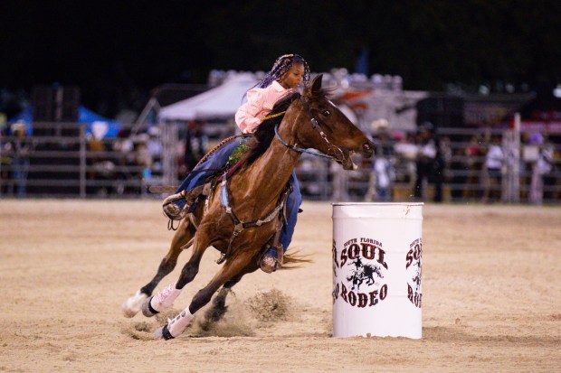 Cowboys and cowgirls will compete in bull riding, ladies barrel racing, chute dogging and ranch bronc riding during the July 25 South Florida Soul Rodeo, which blends Black cowboy culture with live music and professional rodeo competition. (Andrew Millar for South Florida Soul Rodeo / Courtesy)