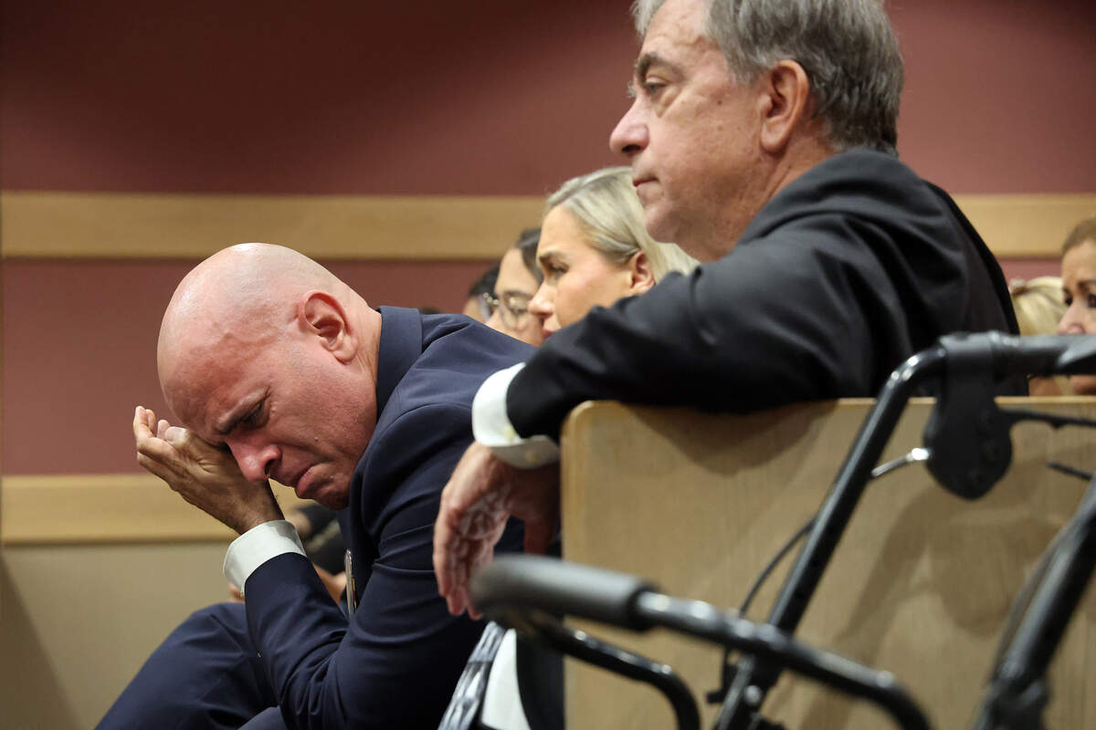 Frank Urrutia cries during the hearing. He said his son Zeke was ‘my best shipmate.’