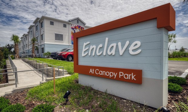 Sign for The Enclave at Canopy Park, on Monday, July 13, 2026. (Ricardo Ramirez Buxeda/ Orlando Sentinel)
