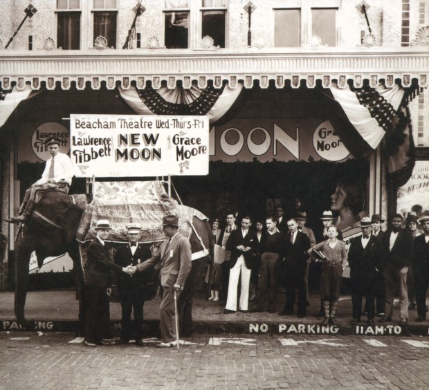 An elephant makes a splash in 1930 outside the Beacham, Orlando's premier downtown movie theater for decades. (Courtesy Orange County Regional History Center)