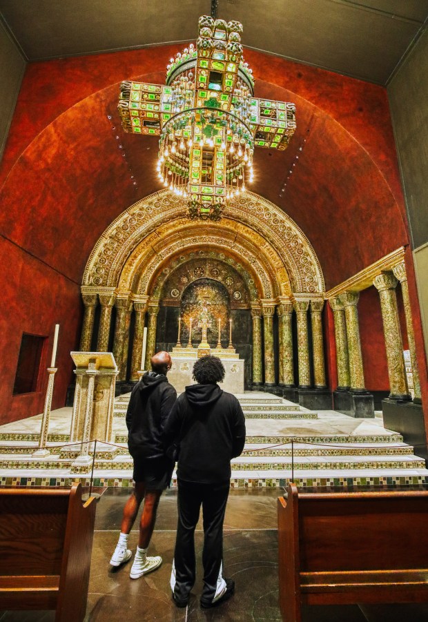 Left to Right, Reggie Beverly and Greg Fonseca admire the Tiffany Chapel at the Charles Hosmer Morse Museum of American Art in Winter Park, on Tuesday, Oct. 8, 2024. ..(Ricardo Ramirez Buxeda/ Orlando Sentinel)