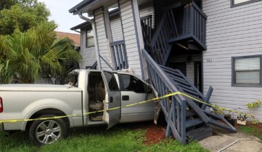 Two children hospitalized after car crashes into Hillsborough County apartment