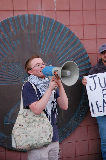 student yells into microphone.