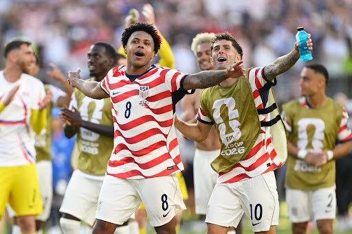 United States' Weston McKennie (8) and Christian Pulisic (10) celebrate winning the World Cup round of 32 soccer match between the United States and Bosnia in Santa Clara, Calif., Wednesday, July 1, 2026. (AP Photo/Eakin Howard)