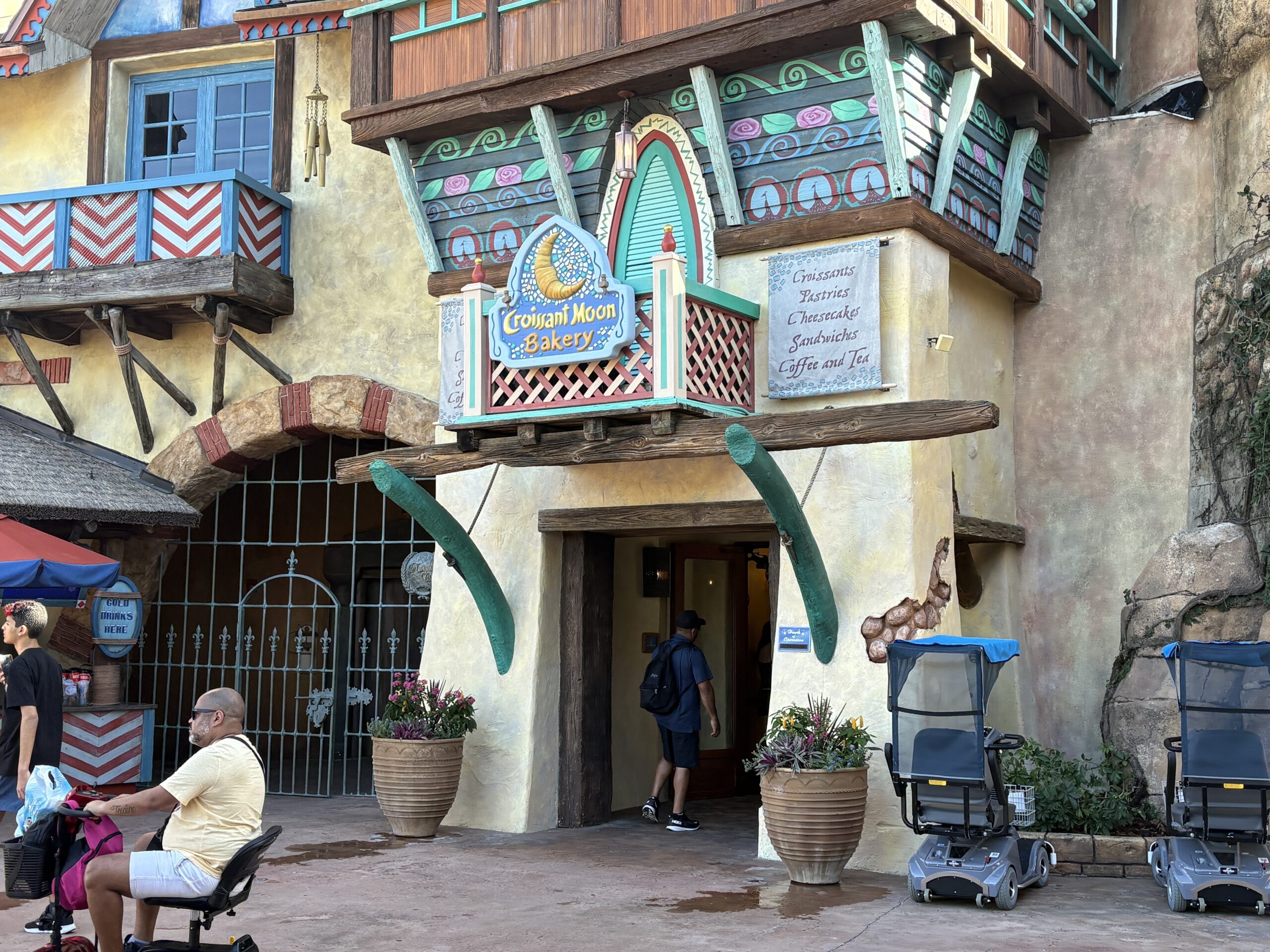 Exterior refurbishment work is complete at Croissant Moon Bakery as the walls have come down, revealing freshly repainted facade elements.
