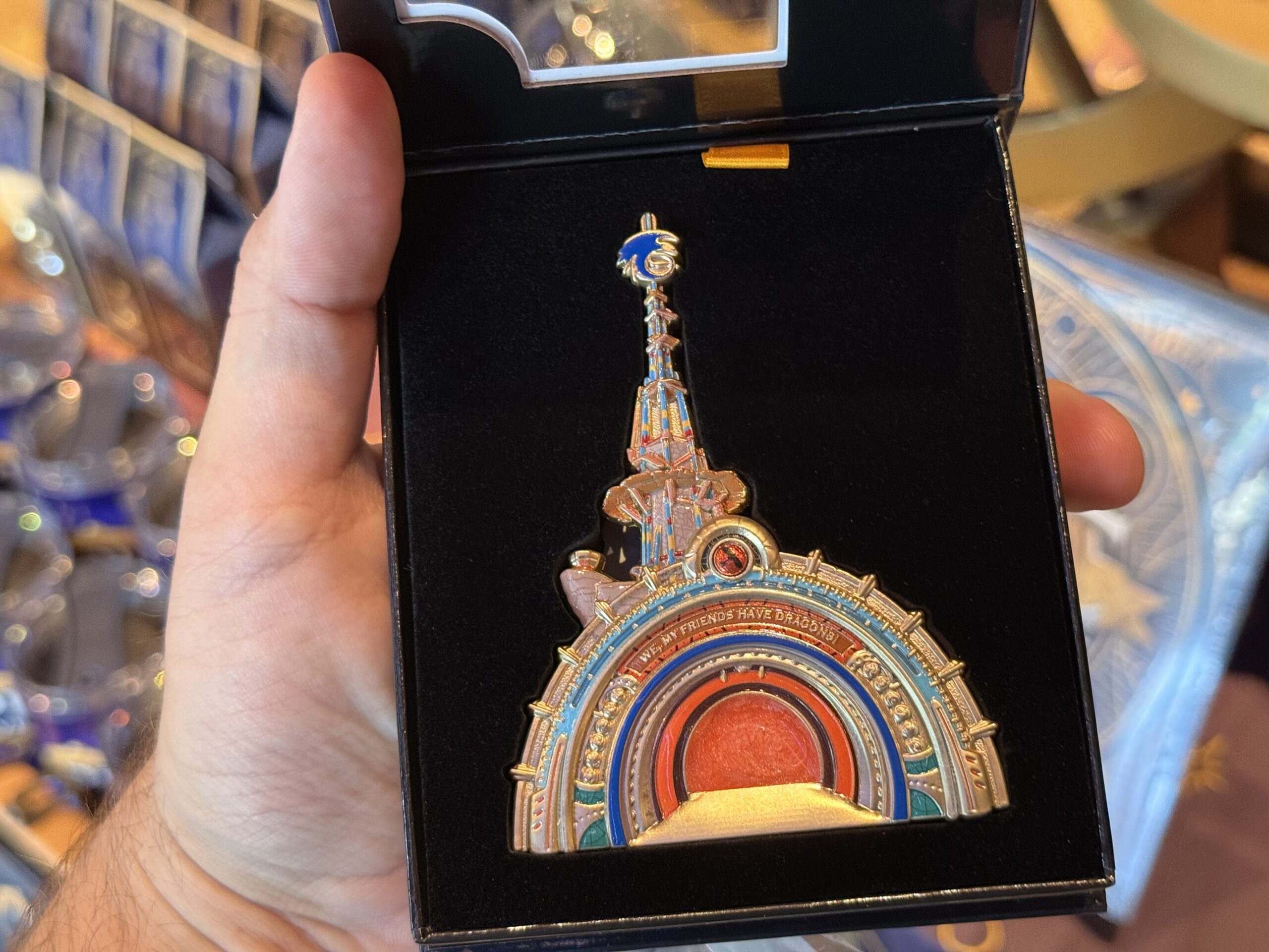 This portal pin is designed to look very similar to the real portal into Isle of Berk at Epic Universe. Featuring blues and oranges, it has