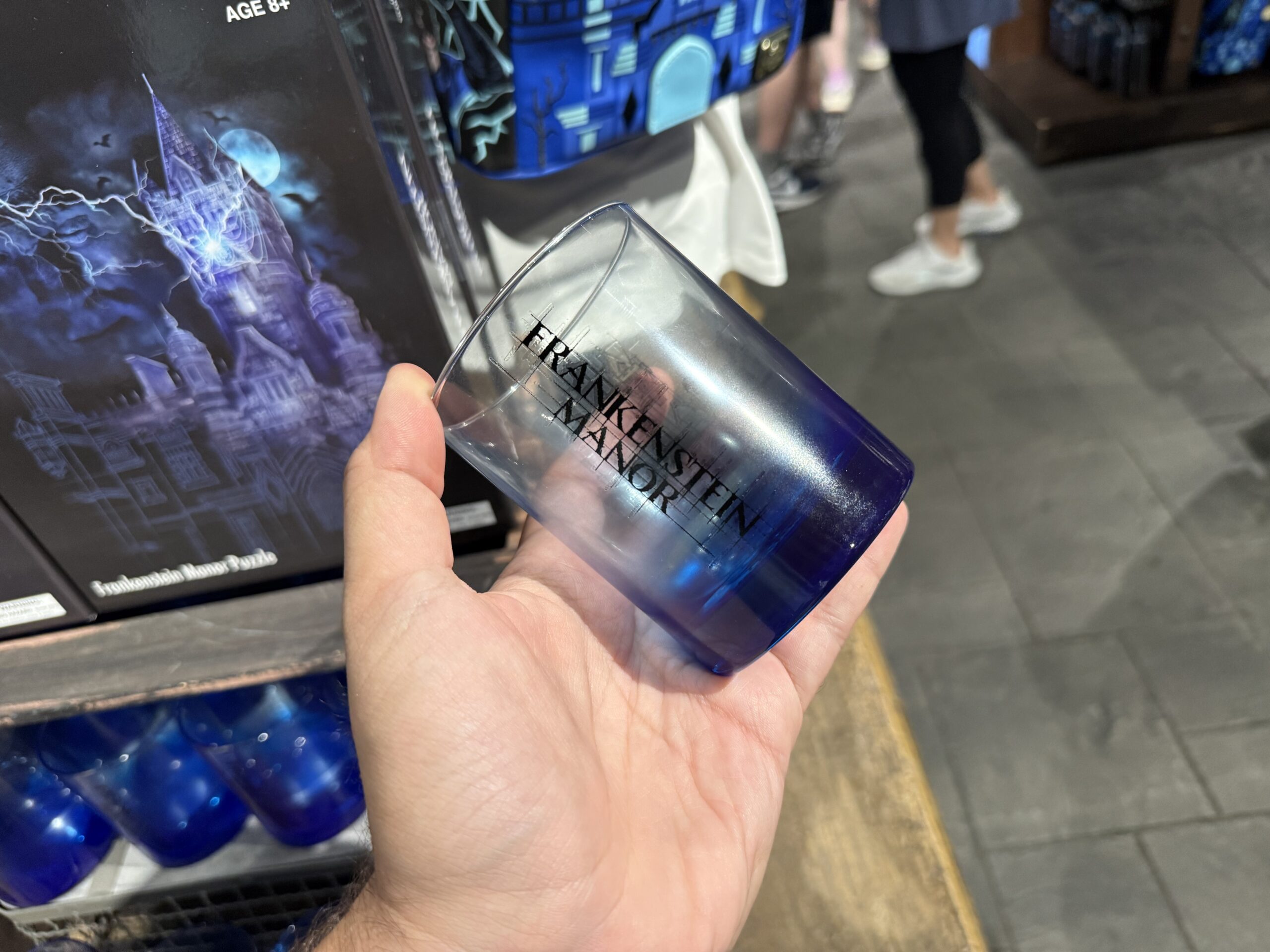 Blueprint art of the manor is in black on one side of this glass. On the reverse is "Frankenstein Manor." It has a blue ombré base. It's hand wash only.