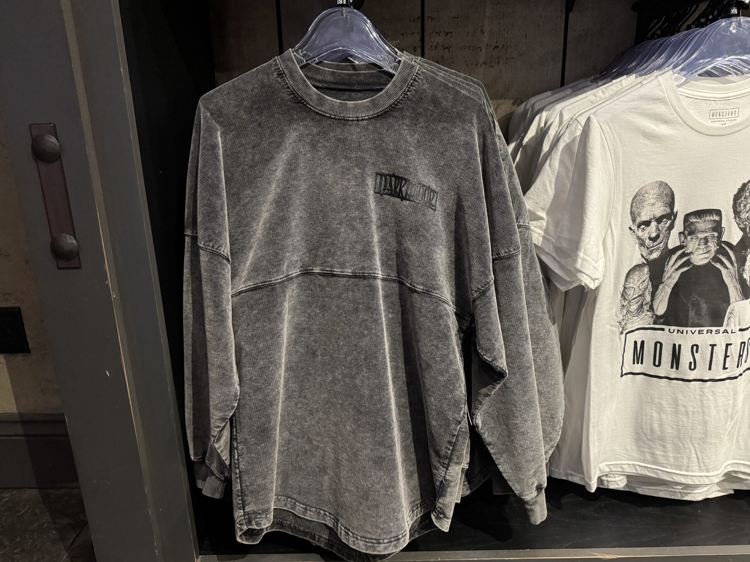 The Spirit Jersey is a heavy material and feels like corduroy. It's a weathered black with "Darkmoor" in puffy ink on the left chest.