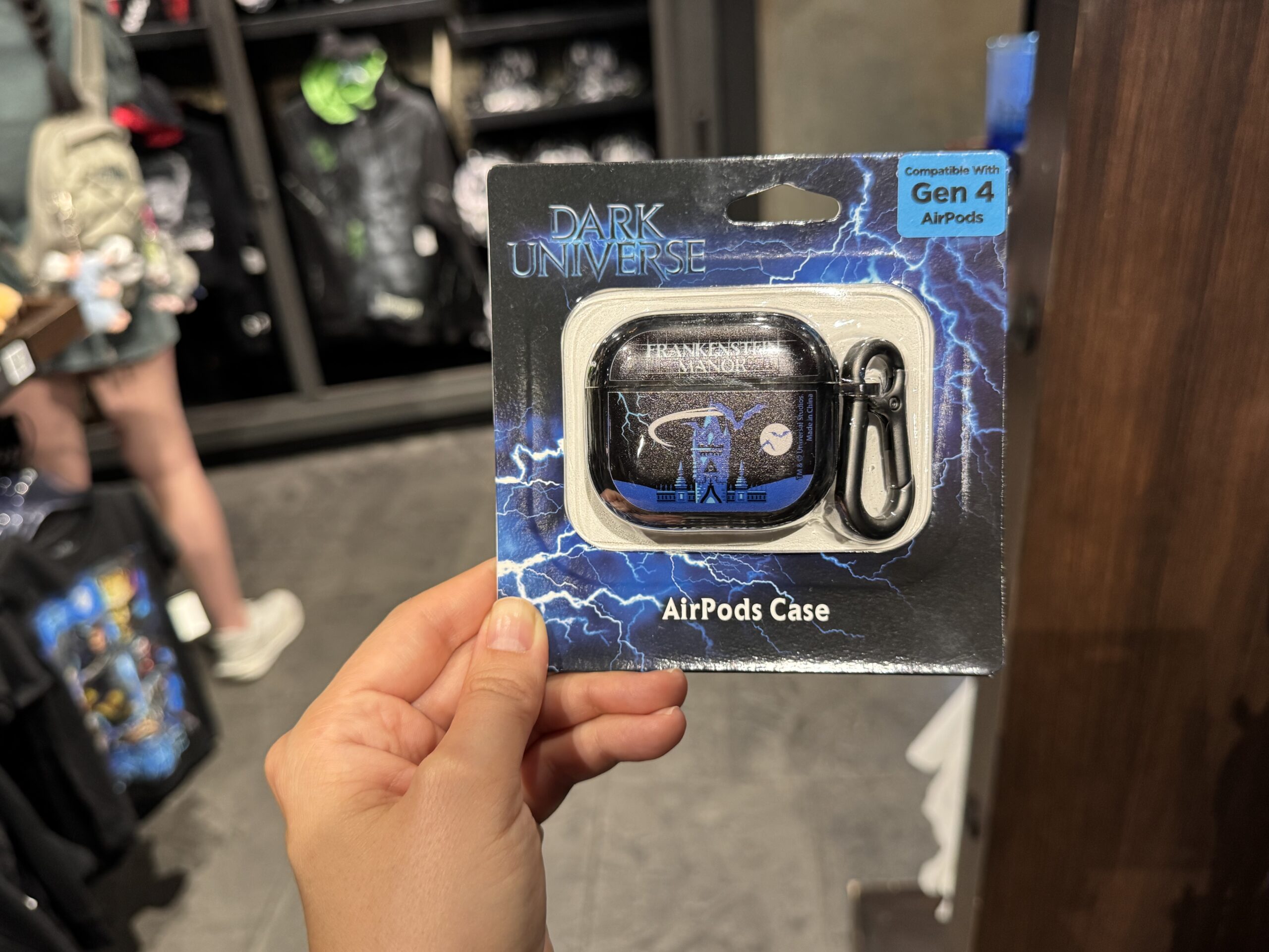 There are multiple versions of the AirPods case for Gen 1 and 2 AirPods Pro and Gen 4 AirPods. All three styles feature the towers of Frankenstein Manor in blue with bats flying across the sky and moon.