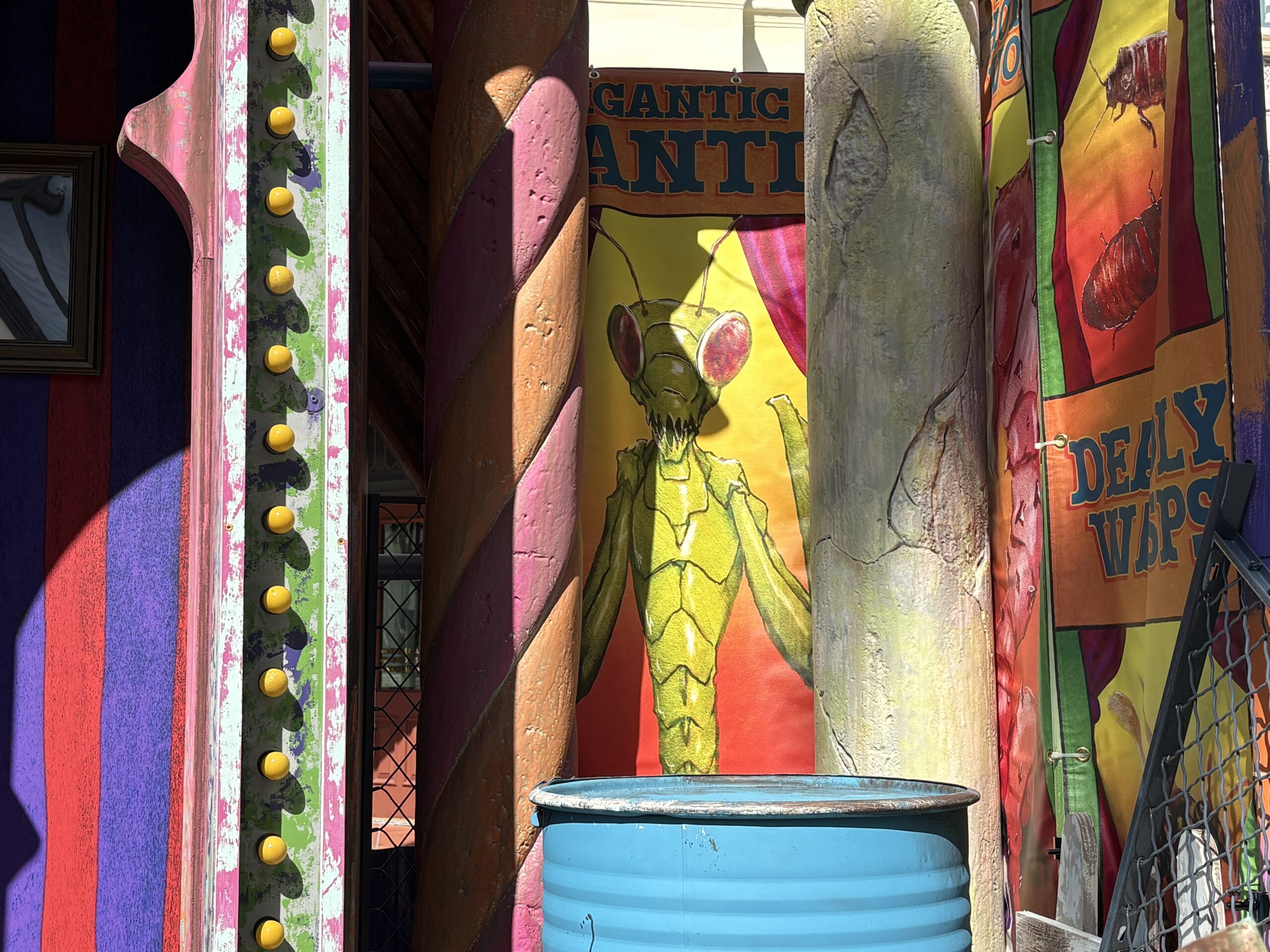 Made up of weathered but colorful walls, banners, and broken attractions, each set has a different theme. This one, as seen on the sign above the stage, is the