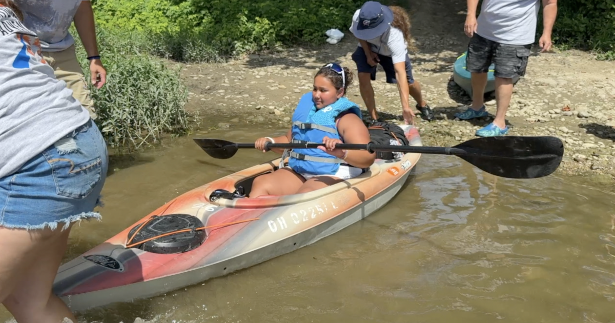 Heat wave sends paddlers to the Great Miami River in search of relief