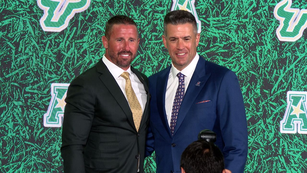 USF head football coach Brian Hartline and American Conference commissioner Tim Pernetti pose for a picture at American Conference Football Media Days on Friday, July 24, 2026 in St. Petersburg, Florida. (Michael Epps - Spectrum Sports 360)