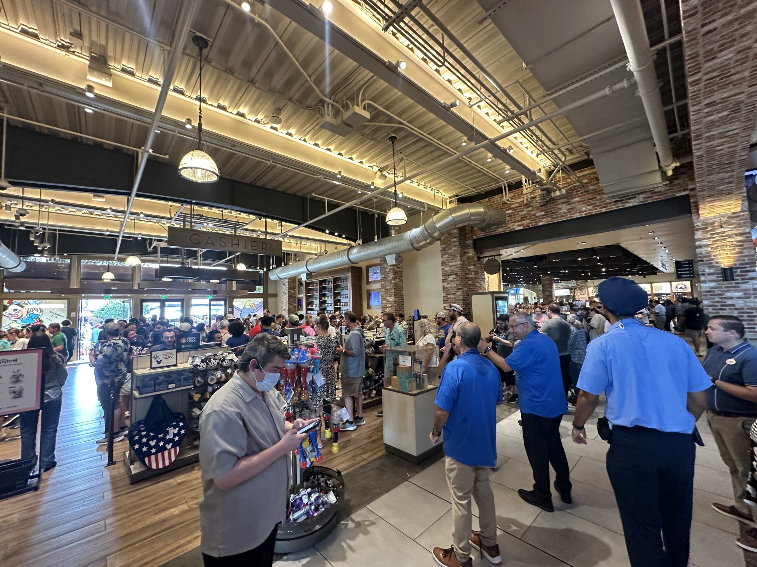 Disney Springs has a big crowd and long lines of guests trying to grab the Lorcana Curator’s Collection: Heroines Edition and the Disney Lorcana Attack of the Vine set, which are both releasing today, July 17.