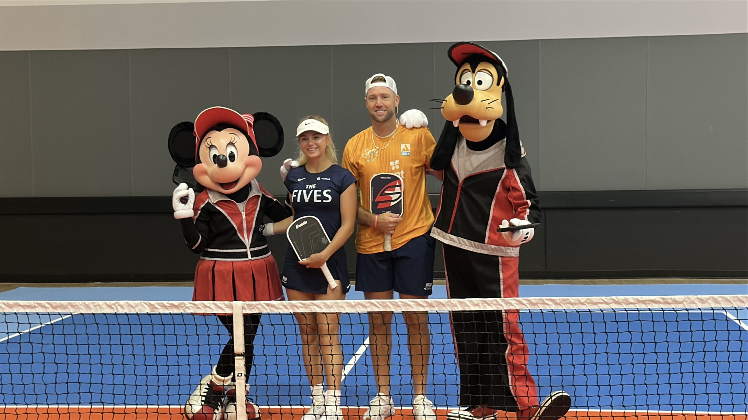 Minnie and Goofy also stopped by in sporting gear. Goofy struggled a bit with his form but we were impressed by Minnie's playing!