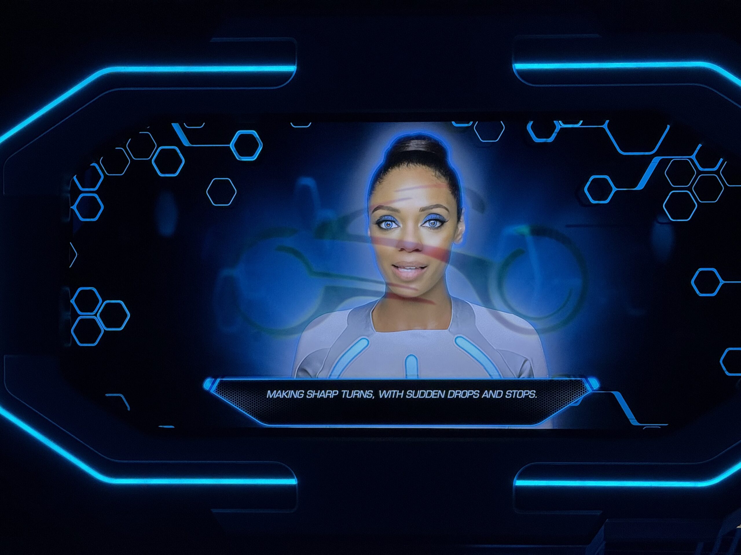 Most of the screens in the TRON Lightcycle Run queue at Magic Kingdom now have images of lightcycles burnt into them.