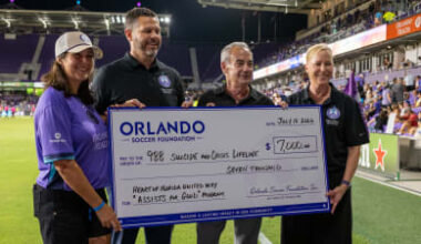 Orlando Pride and Heart of Florida United Way celebrate impact of "Assists for Good" campaign with $7,000 donation to 988 Suicide & Crisis Lifeline