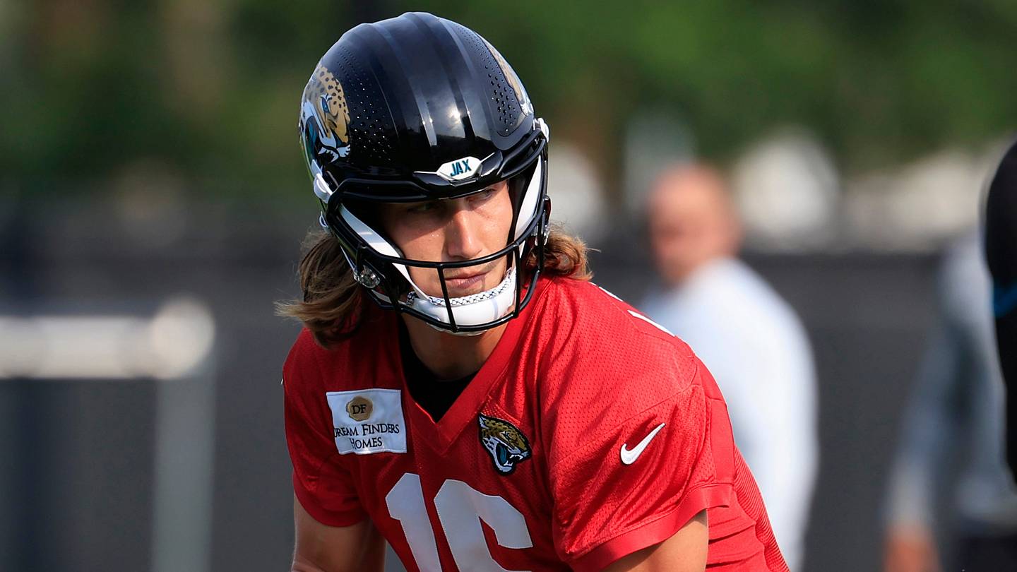 Jacksonville Jaguars quarterback Trevor Lawrence (16) looks to hand off during the third day of NFL Training Camp at the Miller Electric Center on Friday, July 31, 2026, in Jacksonville, Fla.