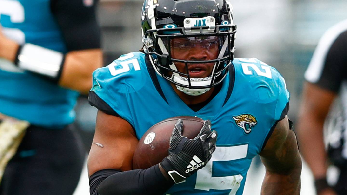 Nov 28, 2021; Jacksonville, Florida, USA;  Jacksonville Jaguars running back James Robinson (25) runs with the ball in the first half against the Atlanta Falcons at TIAA Bank Field. Mandatory Credit: Nathan Ray Seebeck-USA TODAY Sports
