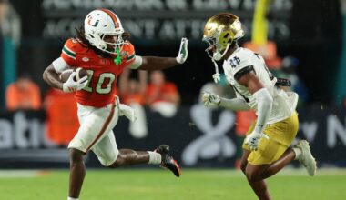 Aug 31, 2025; Miami Gardens, Florida, USA; Miami Hurricanes wide receive Malachi Toney (10) runs with the football against Notre Dame Fighting Irish cornerback Karson Hobbs (21) during the first half at Hard Rock Stadium. Mandatory Credit: Sam Navarro-Imagn Images