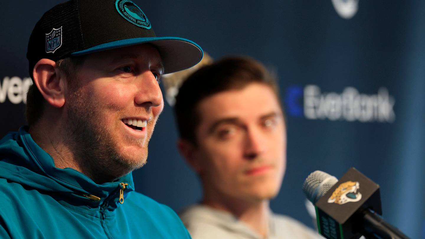 Jacksonville Jaguars head coach Liam Coen, left, speaks next to general manager James Gladstone during a press conference at Miller Electric Center Tuesday, April 15, 2025 in Jacksonville, Fla.