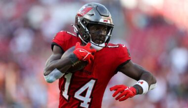 Dec 31, 2023; Tampa, Florida, USA;  Tampa Bay Buccaneers wide receiver Chris Godwin (14) catches a pass for a touchdown against the New Orleans Saints in the fourth quarter at Raymond James Stadium. Mandatory Credit: Nathan Ray Seebeck-USA TODAY Sports