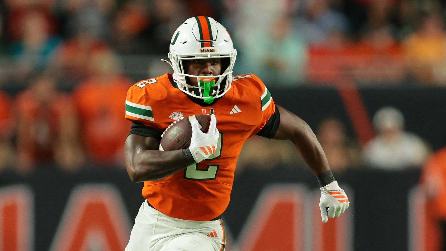 Oct 17, 2025; Miami Gardens, Florida, USA; Miami Hurricanes running back Jordan Lyle (2) carries the football against the Louisville Cardinals during the fourth quarter at Hard Rock Stadium. Mandatory Credit: Sam Navarro-Imagn Images