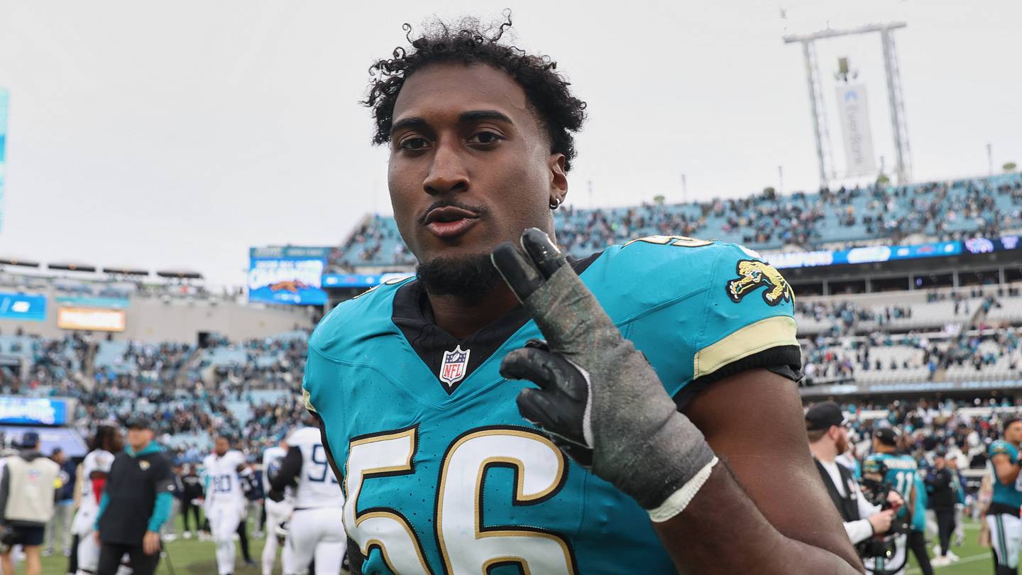 Jan 4, 2026; Jacksonville, Florida, USA; Jacksonville Jaguars linebacker Yasir Abdullah (56) reacts as he walks off the field after the game against the Tennessee Titans at EverBank Stadium.