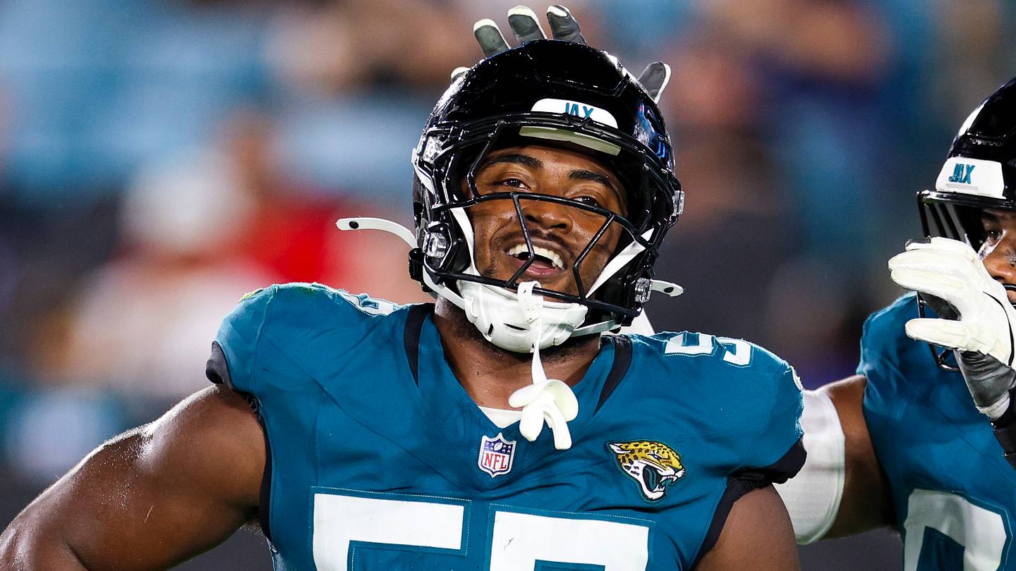 Aug 28, 2026; Jacksonville, Florida, USA; Jacksonville Jaguars defensive end Bryan Thomas Jr. (57) reacts with tight end Hunter Long (84) and defensive tackle Jalen Hunt (96) after a sack against the Tampa Bay Buccaneers in the third quarter during preseason at EverBank Stadium.