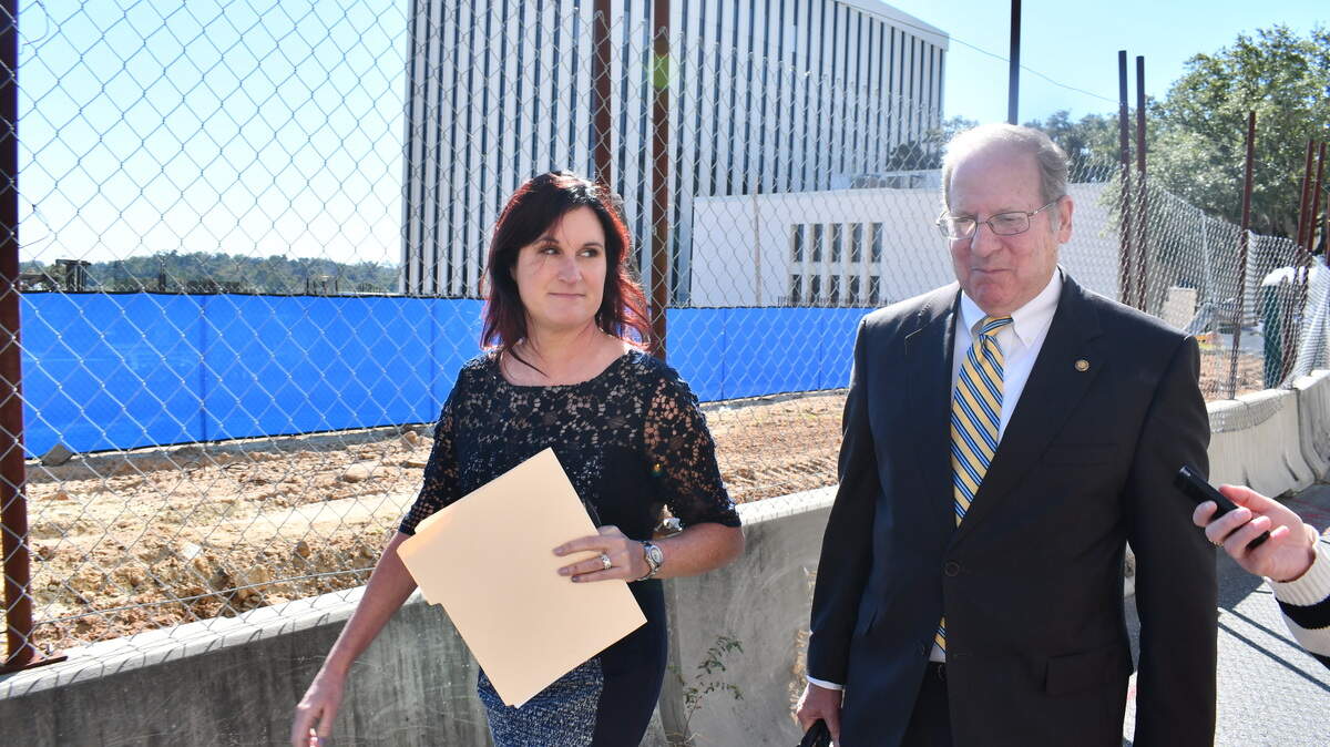 Amy Ronshausen and her attorney, Ken Sukhia, after leaving the Leon County Courthouse on Tuesday, Oct. 14. Ronshausen wouldn’t answer a reporter’s question about her testimony to the grand jury in the case involving the Hope Florida Foundation. Amy Ronshausen and her attorney, Ken Sukhia, after leaving the Leon County Courthouse on Tuesday, Oct. 14. Ronshausen wouldn’t answer a reporter’s question about her testimony to the grand jury in the case involving the Hope Florida Foundation.