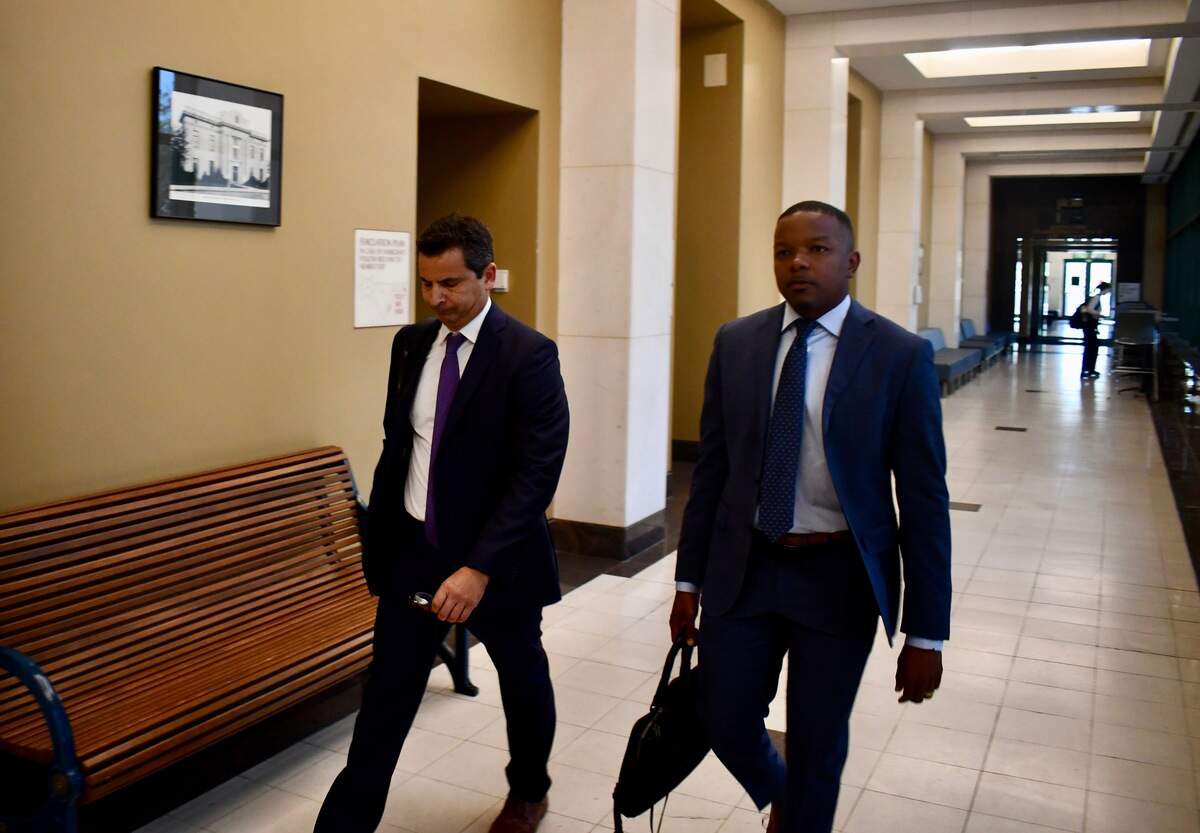 Former Hope Florida Foundation President Joshua Hay, right, leaves the Leon County Courthouse on Wednesday, Oct. 15, 2025.
