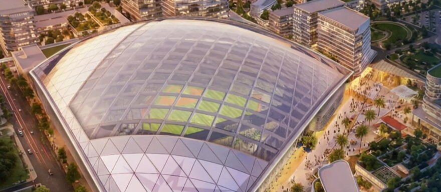 An aerial view, a rendering of a triangle-shaped glass roof on top of a stadium