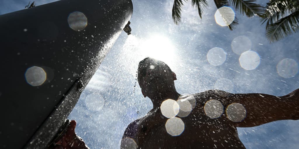 How low will temperatures drop in Miami?