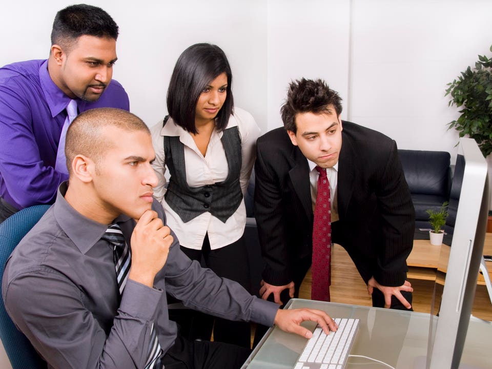 Business Team Studies A Problem
