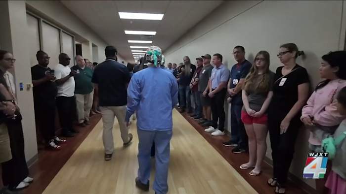 Jacksonville family shares emotional honor walk experience after husband, father dies
