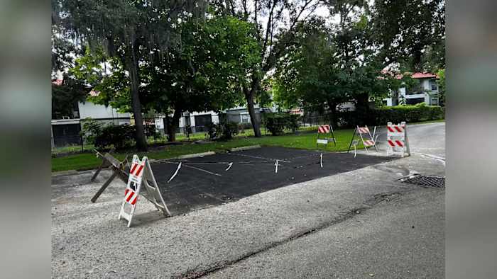 Spectrum pays up after News 6 investigation into year-long parking lot damage at MetroWest condos