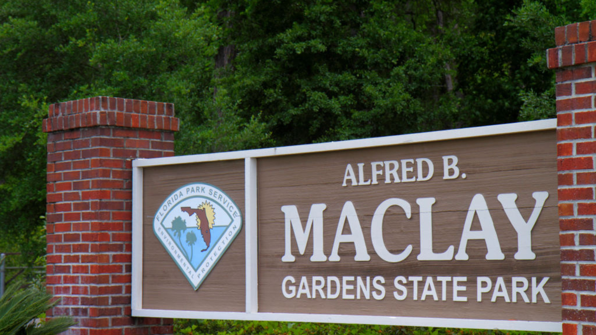 Alfred B. Maclay Gardens State Park entrance sign at park entrance.