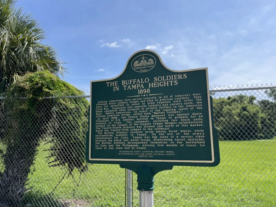 A rectangular metal green marker detailing the Buffalo Soldiers’ tie to Tampa.