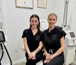Two medical spa practioners smiling