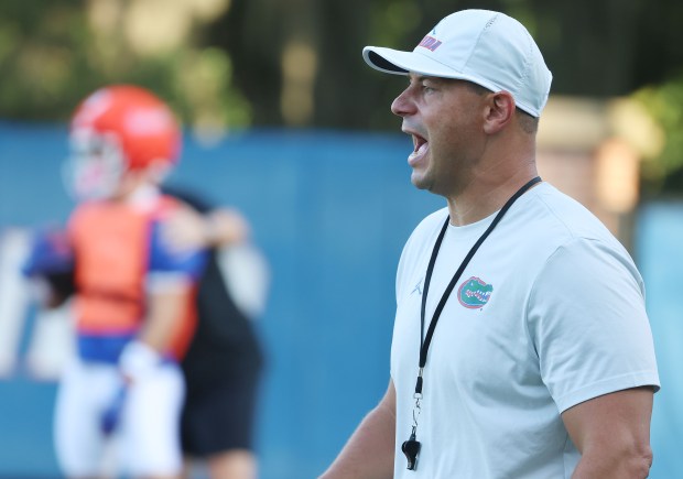 Florida head coach Jon Sumrall yells during the Gators' preseason camp at the UF practice facility Aug. 5 in Gainesville.(Stephen M. Dowell/Orlando Sentinel)