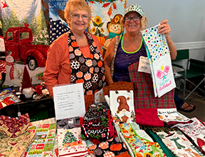 Vendors display handmade quilted towels and linens at a past Mandarin Garden Club Craft Fair. Photo courtesy of Mandarin Garden Club