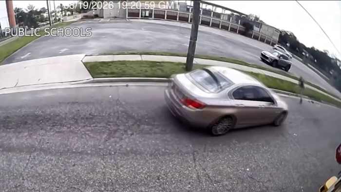 DCPS officials warn drivers after video shows car narrowly missing child after illegally driving around school bus