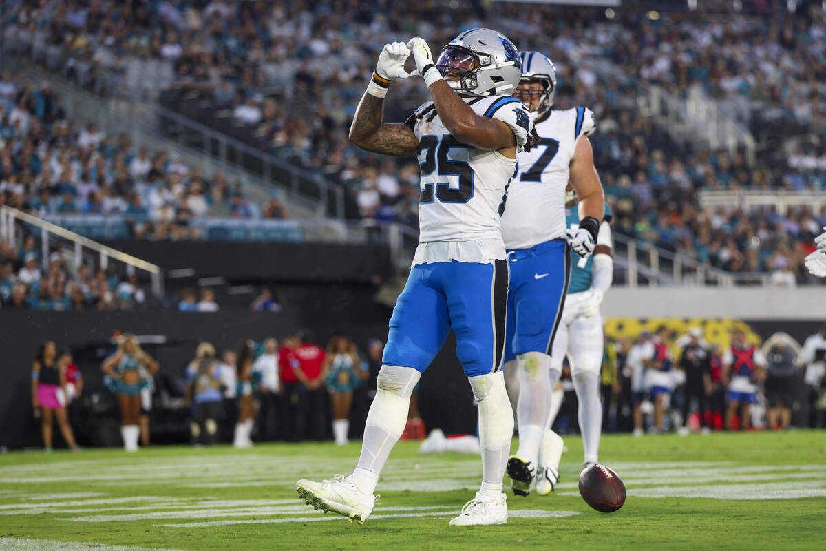 Carolina Panthers running back Jonathon Brooks (25) reacts after scoring a touchdown against the Jacksonville Jaguars in the first quarter during a preseason game at EverBank Stadium on Friday, Aug. 21, 2026.
