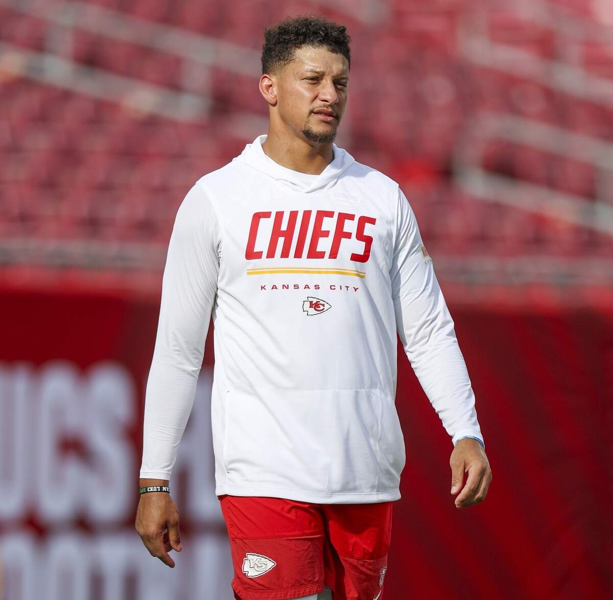 Kansas City Chiefs quarterback Patrick Mahomes walks the field before a preseason NFL game against the Buccaneers at Raymond James Stadium in Tampa.