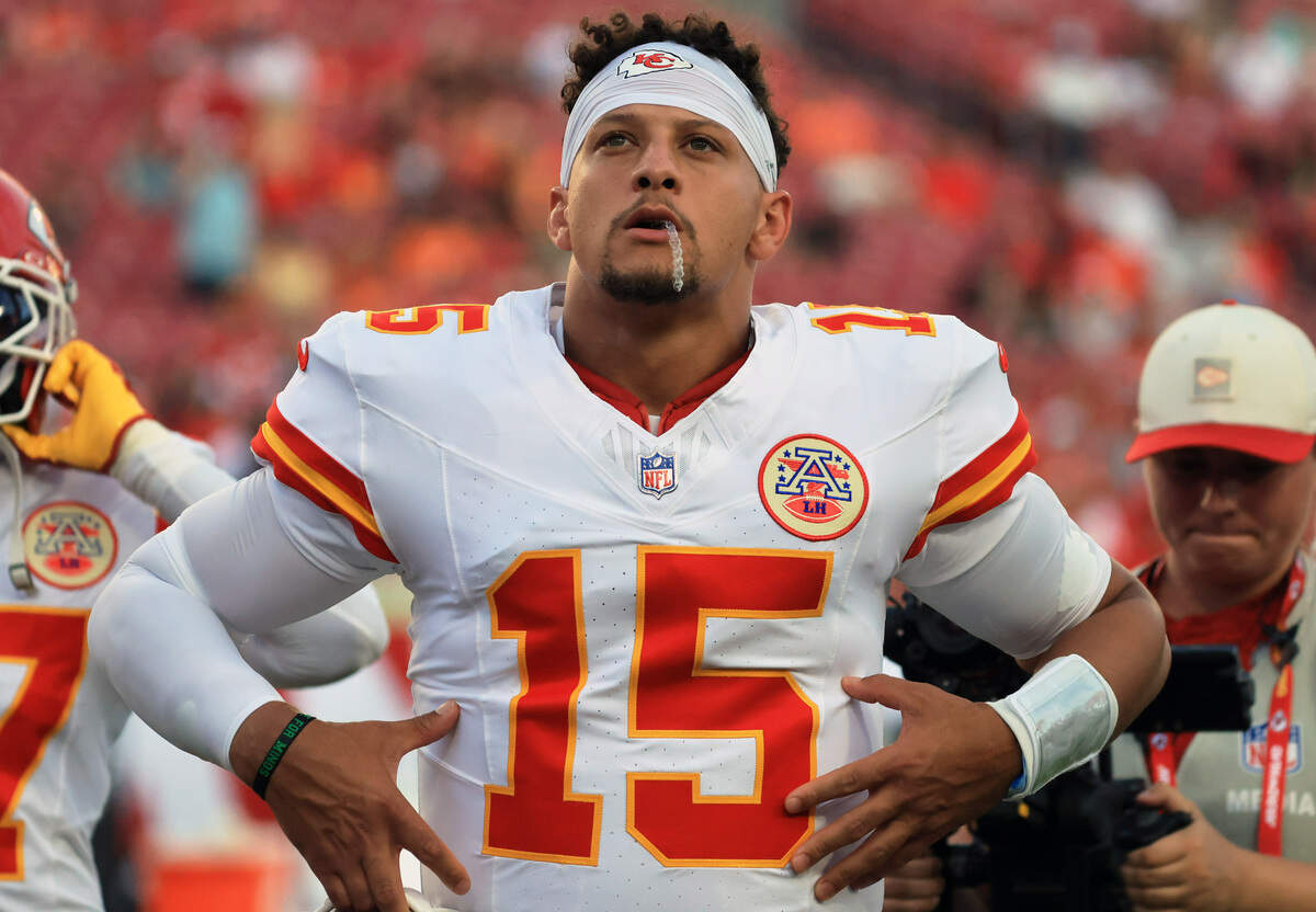 Kansas City Chiefs quarterback Patrick Mahomes looks on prior to a preseason NFL game against the Buccaneers at Raymond James Stadium in Tampa.
