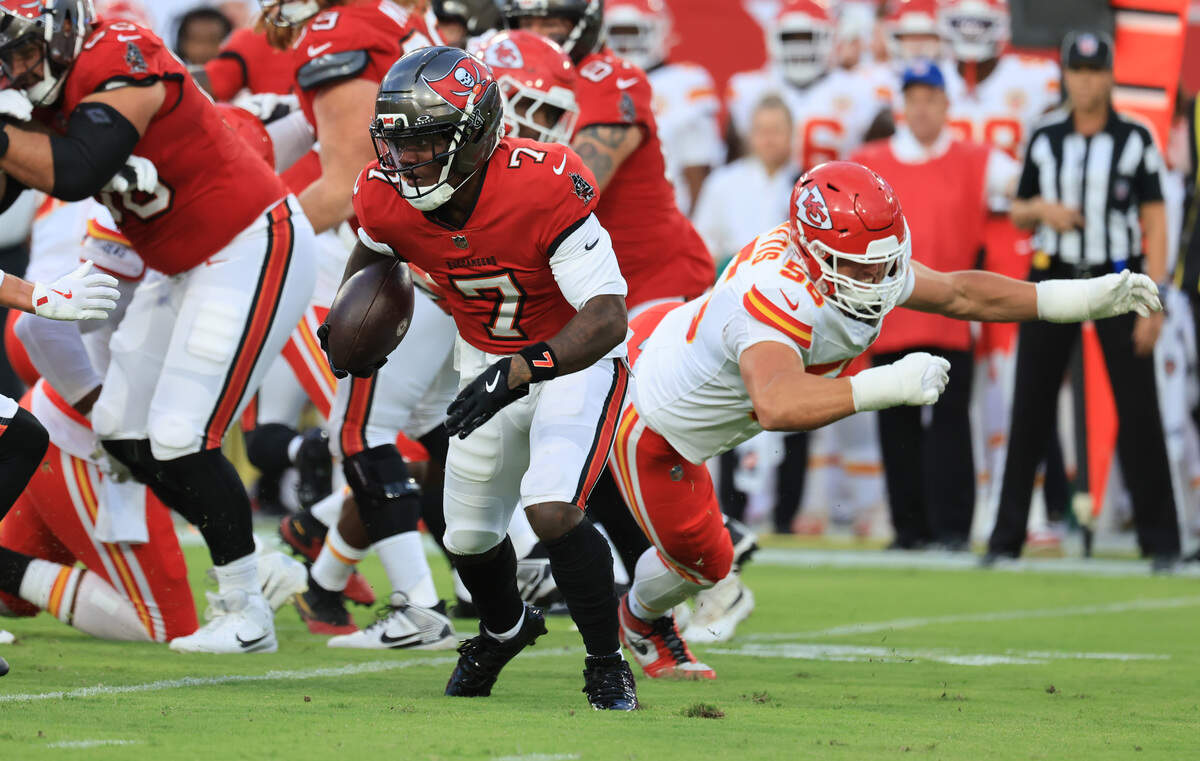 Tampa Bay Buccaneers running back Bucky Irving (7) runs with the ball against the Kansas City Chiefs during a preseason NFL game at Raymond James Stadium in Tampa on Saturday, Aug. 22, 2026.